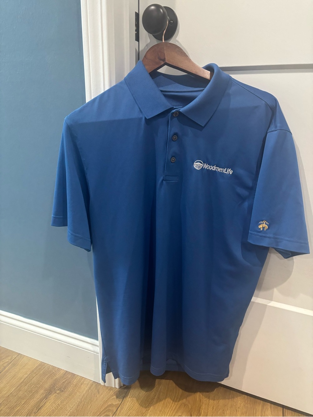 Women’s Woodmen Life polo shirts. One size small and 6 size medium.